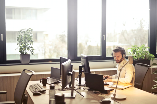 Staff assisting customer with IVR recording